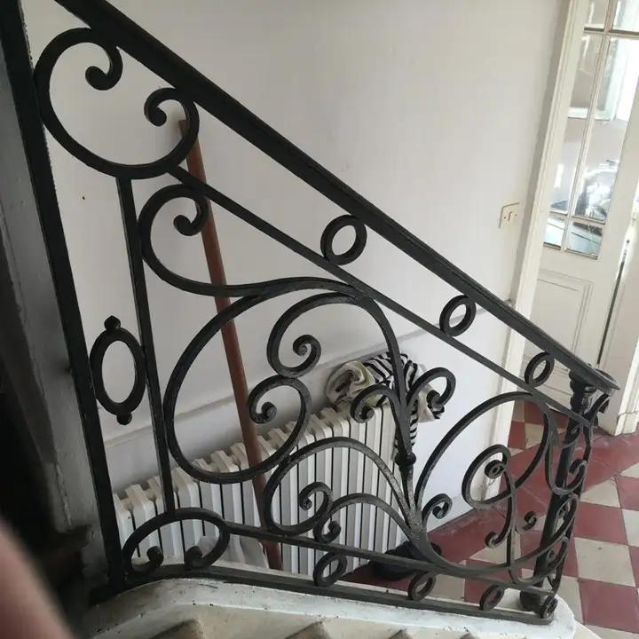 Rampe d'éscalier en fer forgé