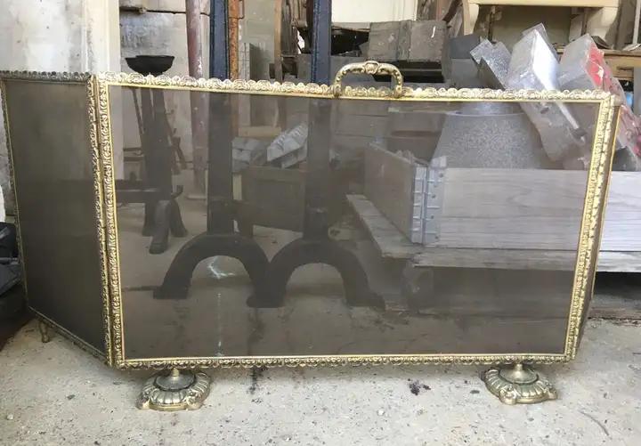 Paire de chenets anciens en fer et cuivre