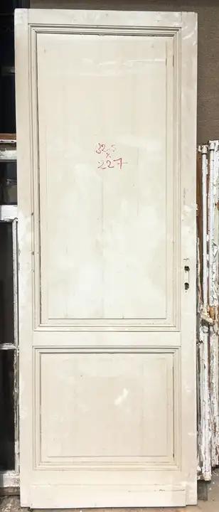 Ancienne porte d'intérieur en bois avec deux panneaux