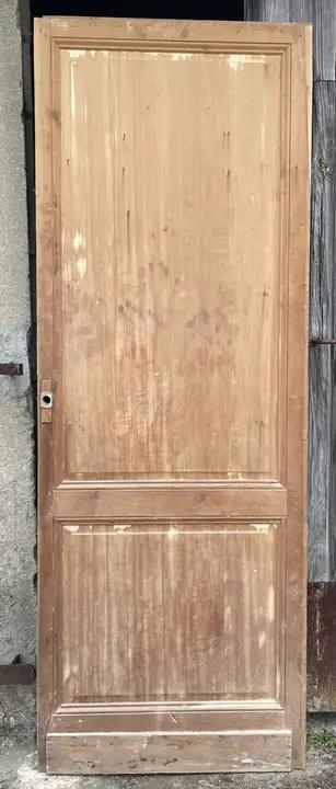 Porte de communication en sapin décapée