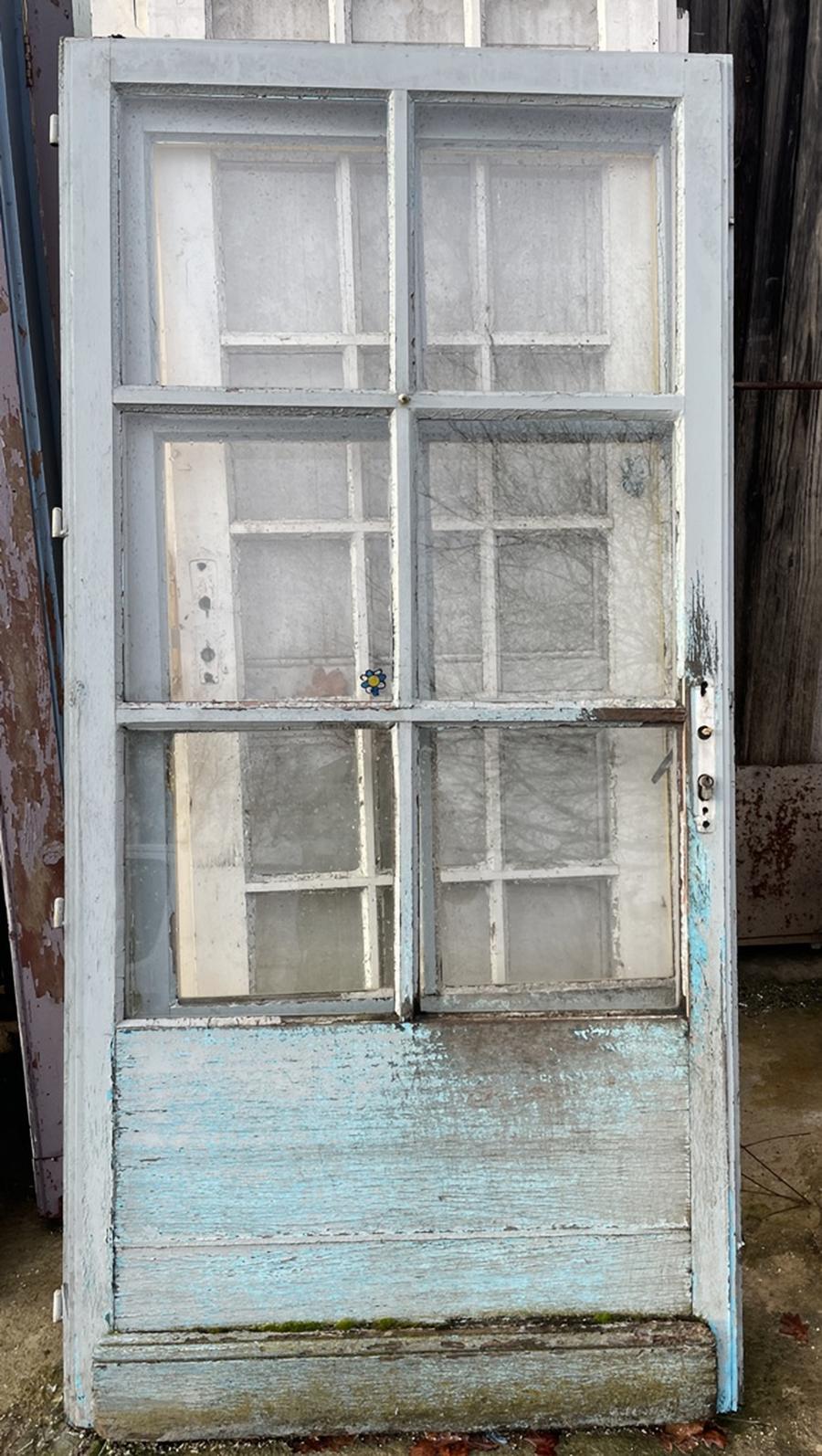 Deux portes vitrées en bois exotique
